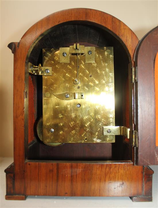 A Victorian ebonised and burr walnut single fusee mantel timepiece, 10.5in.